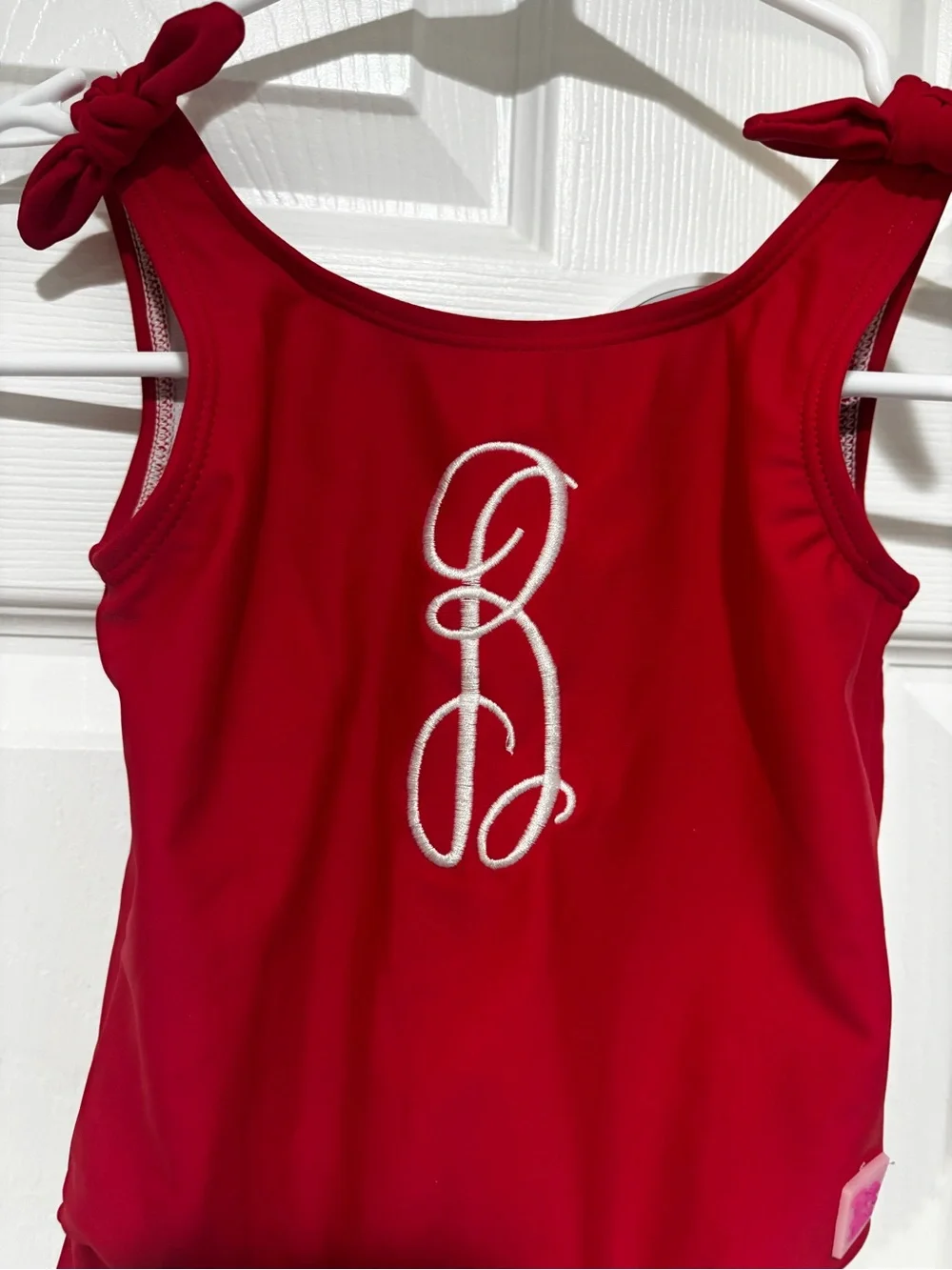Ruffle Butts Red Girls One-Piece Swimsuit with “B” monogram